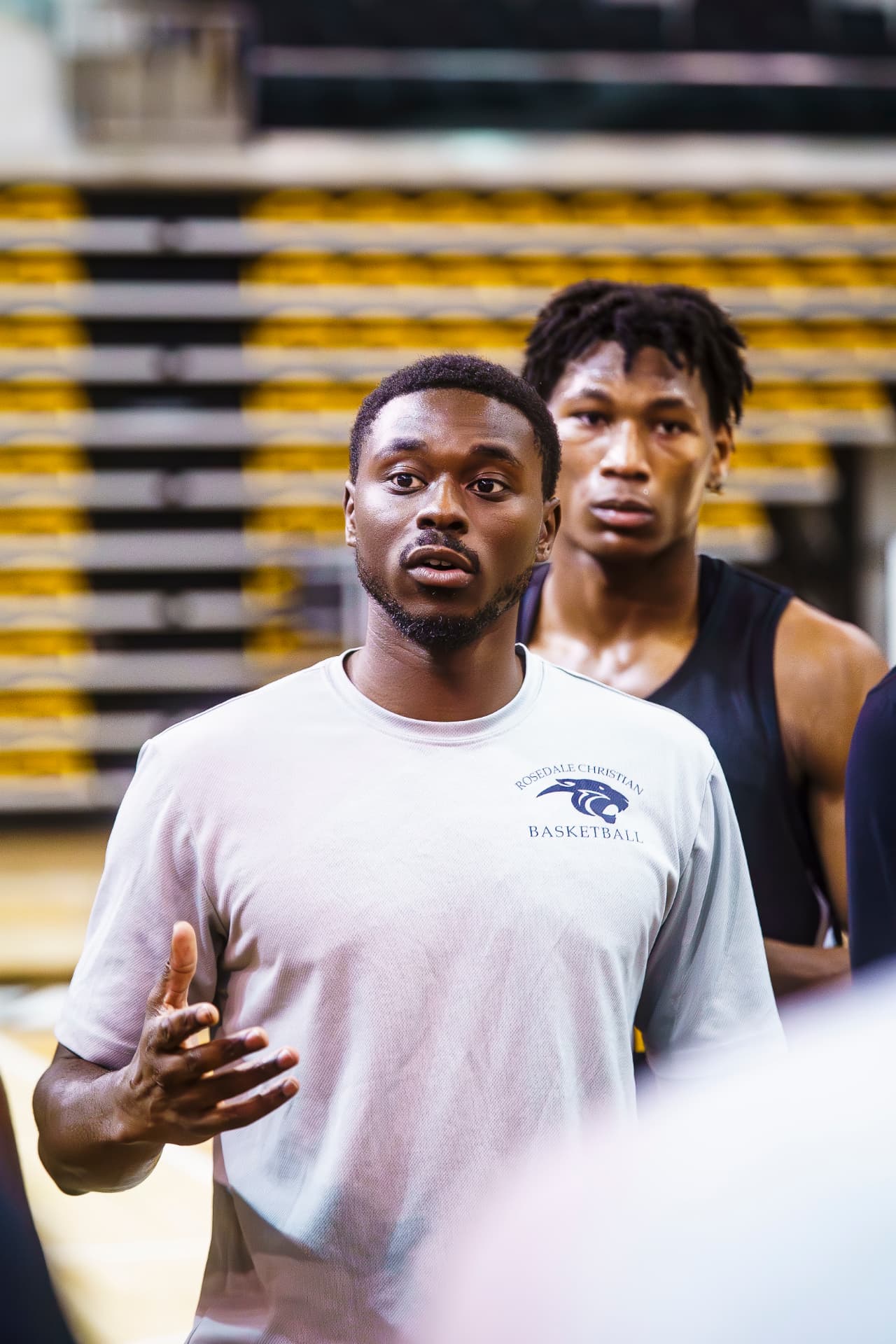 Terry Nolan Jr. coaching a player on the court
